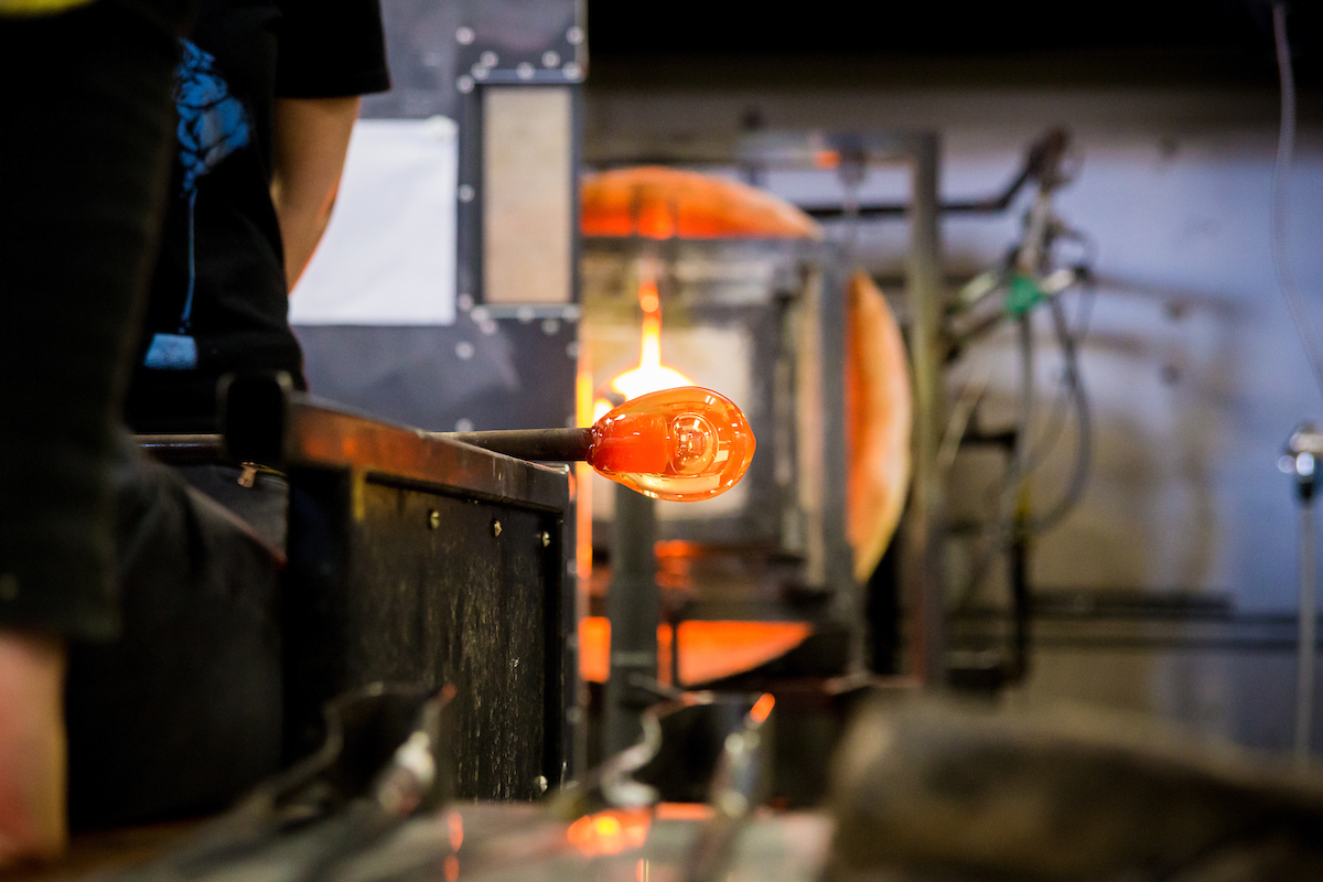 Helen Lee works with molten glass